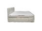 Lit double avec tête de lit et sommier rembourrés blanc cassé, avec matelas blanc.