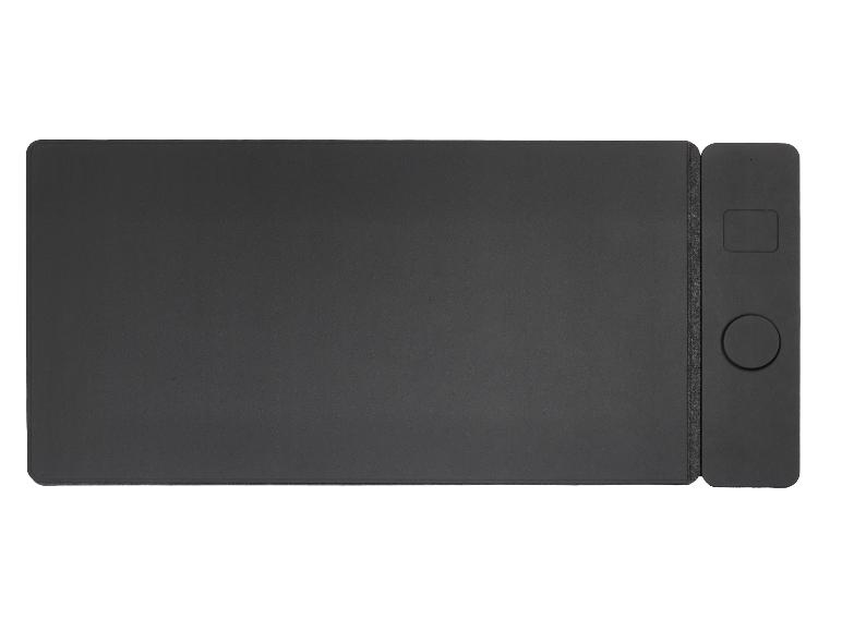 Tablette graphique noire avec boutons de commande et surface de dessin lisse.
