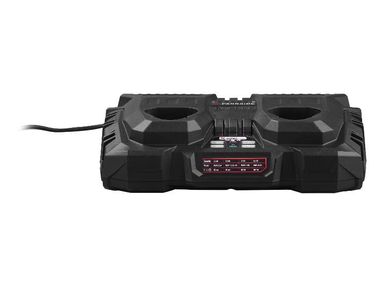 Chargeur double de batteries avec tableau des temps de charge pour diverses capacités de batterie.