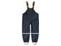 Salopette imperméable bleue pour enfant.