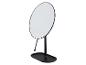 Miroir de table ovale avec pied noir.