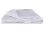 Couette blanche matelassée pliée
