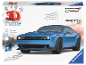 Puzzle 3D d'une voiture de sport bleue dans sa boîte.