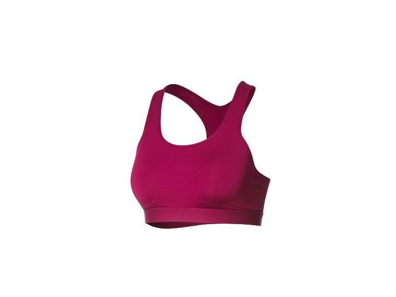 Un soutien-gorge de sport rose pour femme.