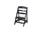 Chaise haute en bois noir pour enfant avec siège et repose-pieds réglables.