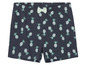 Shorts bleu marine à motif ananas pour filles.