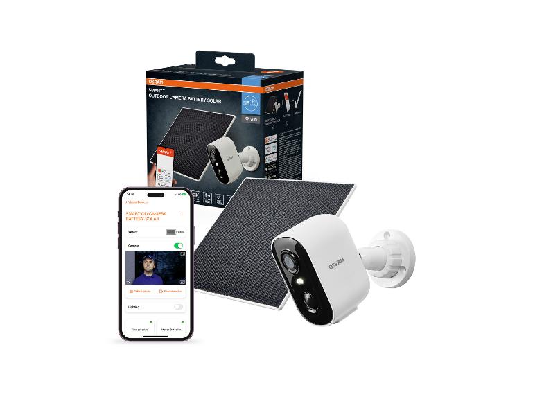 Caméra extérieure intelligente avec panneau solaire, emballage et interface d'application smartphone.