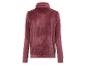 Un sweat en velours rose à manches longues.