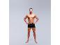 Homme torse nu en caleçon noir, mains sur les hanches, affichant un physique musclé.