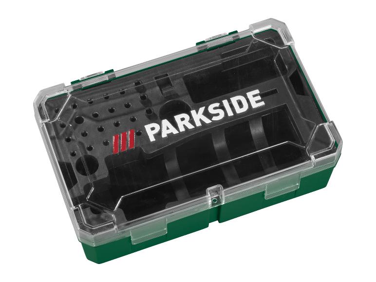 Boîte de rangement d'outils avec couvercle transparent et base verte.