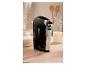 Mixeur KitchenAid 1973 noir sur table en bois.
