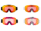 Quatre paires de masques de ski avec des verres colorés et miroirs.