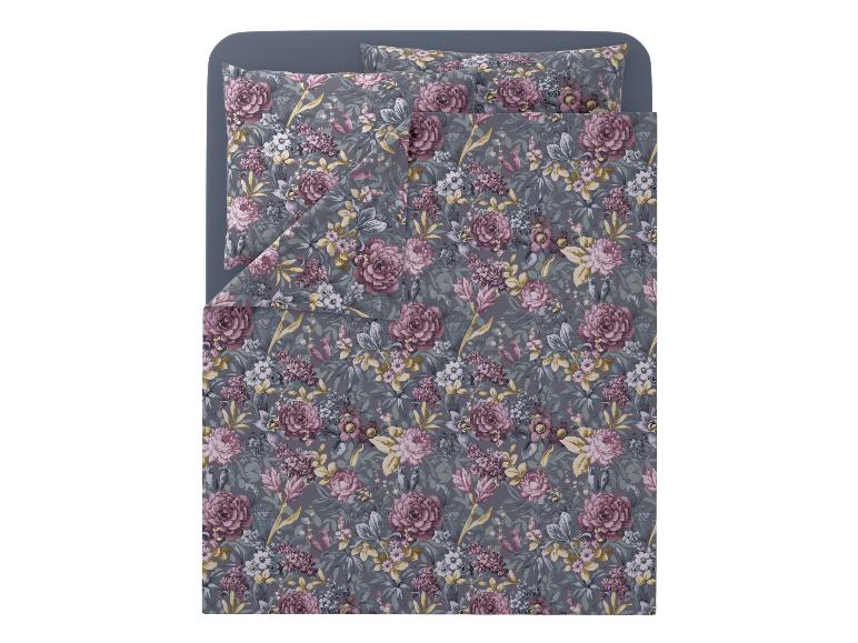 Parure de lit florale avec fond gris foncé et fleurs roses et blanches.
