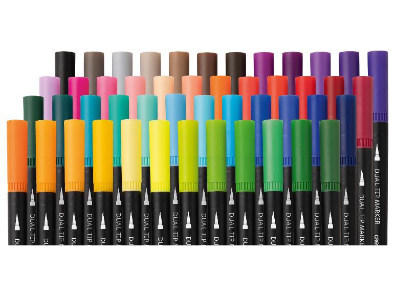 Marqueurs double pointe multicolores disposés en rangées, avec le texte « DUAL TIP MARKER ».