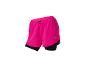 Short de running Crivit rose pour femme avec short intégré.