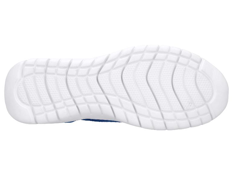 Semelle blanche avec motif pour chaussures de sport.