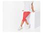 T-shirt blanc, leggings courts corail et baskets blanches pour enfant.
