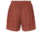Short marron à motif floral.
