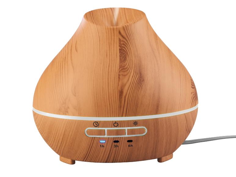 Diffuseur d'arômes aspect bois avec boutons tactiles et indicateurs de temps 1h, 3h, 6h.