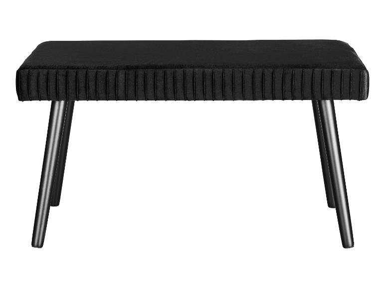 Un banc en velours noir avec des pieds en bois.