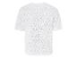 T-shirt blanc en maille avec un motif ajouré.