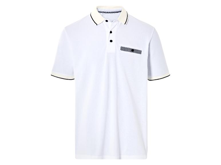 Polo blanc à col contrasté et poche décorative.
