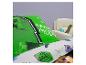 Taie d'oreiller verte avec motif Minecraft et le texte « SURVIVAL MODE ».