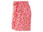 Robe courte à fleurs rouges à nouer à la taille.