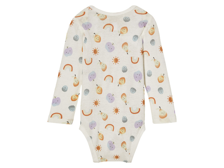 Un body bébé blanc avec un motif d'arc-en-ciel, de soleils et de fruits.