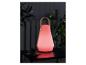 Lampe portable colorée avec anse en cuir, idéale pour l'extérieur.