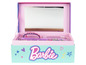 Une boîte rose Barbie avec un miroir, des bandeaux et une brosse.