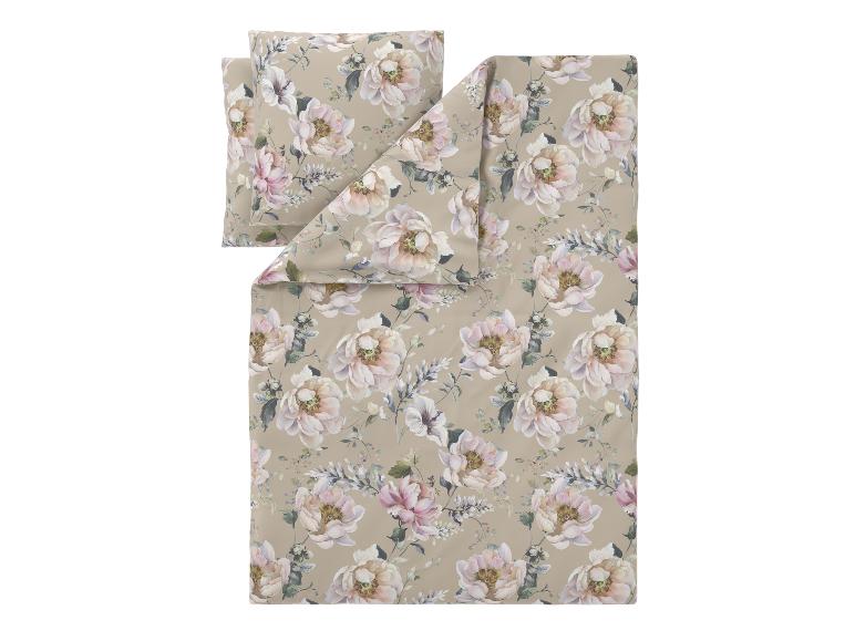 Parure de lit beige à motif floral de pivoines roses et blanches.