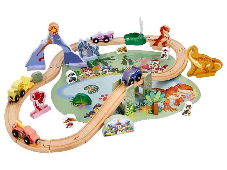 Circuit de train en bois sur le thème des dinosaures avec des véhicules et des personnages de dessins animés.