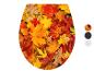 Coussin de WC décoré de feuilles d'automne.