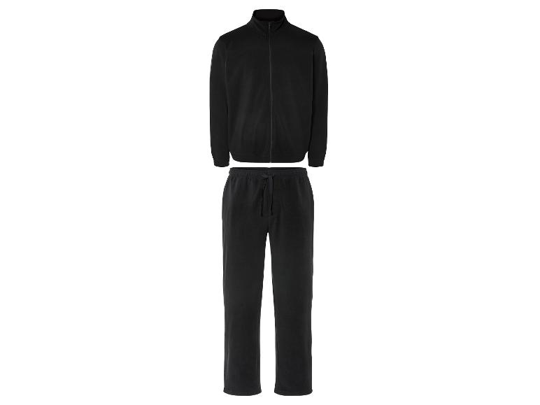 Un survêtement noir avec veste et pantalon
