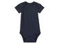 Un body bébé bleu marine à manches courtes.