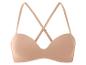 Soutien-gorge beige sans armatures, bretelles croisées.