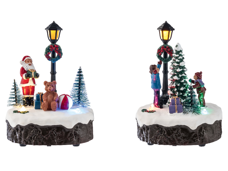 Figurines de village de Noël LED LIVARNO home avec lampadaires illuminés et scènes festives.