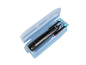 Une brosse à dents électrique noire Nevadent dans une boîte de rangement bleue.