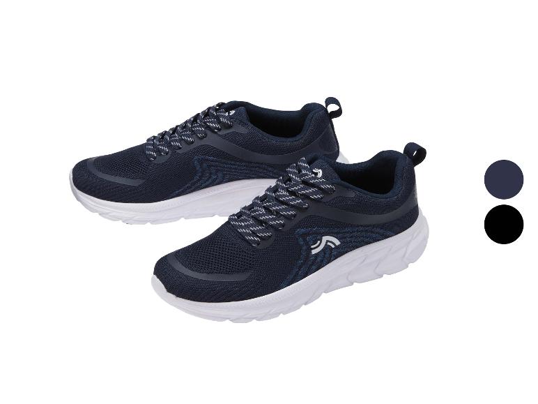 Deux paires de chaussures de sport bleu marine avec semelles blanches et lacets rayés.