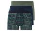 Trois paires de boxers, un avec un motif écossais vert, un bleu marine et un vert clair.