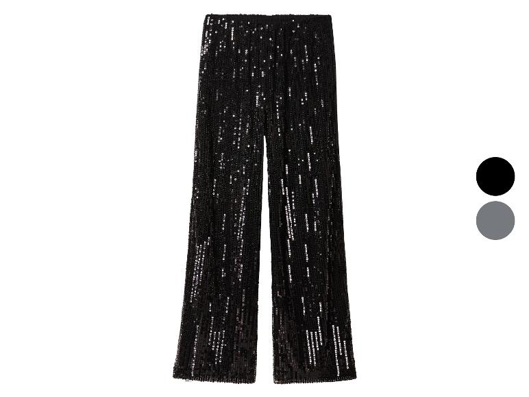 Pantalon noir à paillettes avec taille élastique et coupe large.