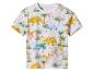 T-shirt blanc avec motif de dinosaures colorés et palmiers.
