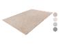 Tapis beige avec motif ondulé et échantillons de couleurs