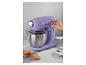 Un robot pâtissier Bergner de couleur lilas avec un bol et des biscuits