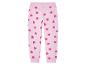 Pantalon de jogging rose à motifs cœurs.
