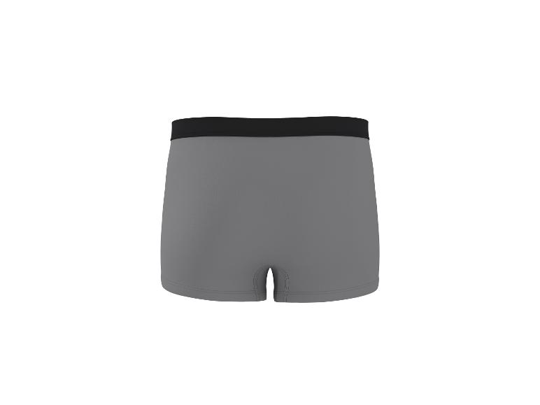 Caleçon gris avec ceinture élastique noire.