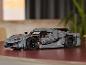 Une voiture de sport LEGO Technic grise avec des détails orange.