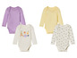Trois bodys pour bébé : un uni violet, un uni jaune et un à imprimé abeilles.
