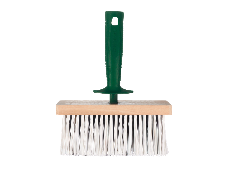 Brosse à badigeonner avec manche vert et poils blancs